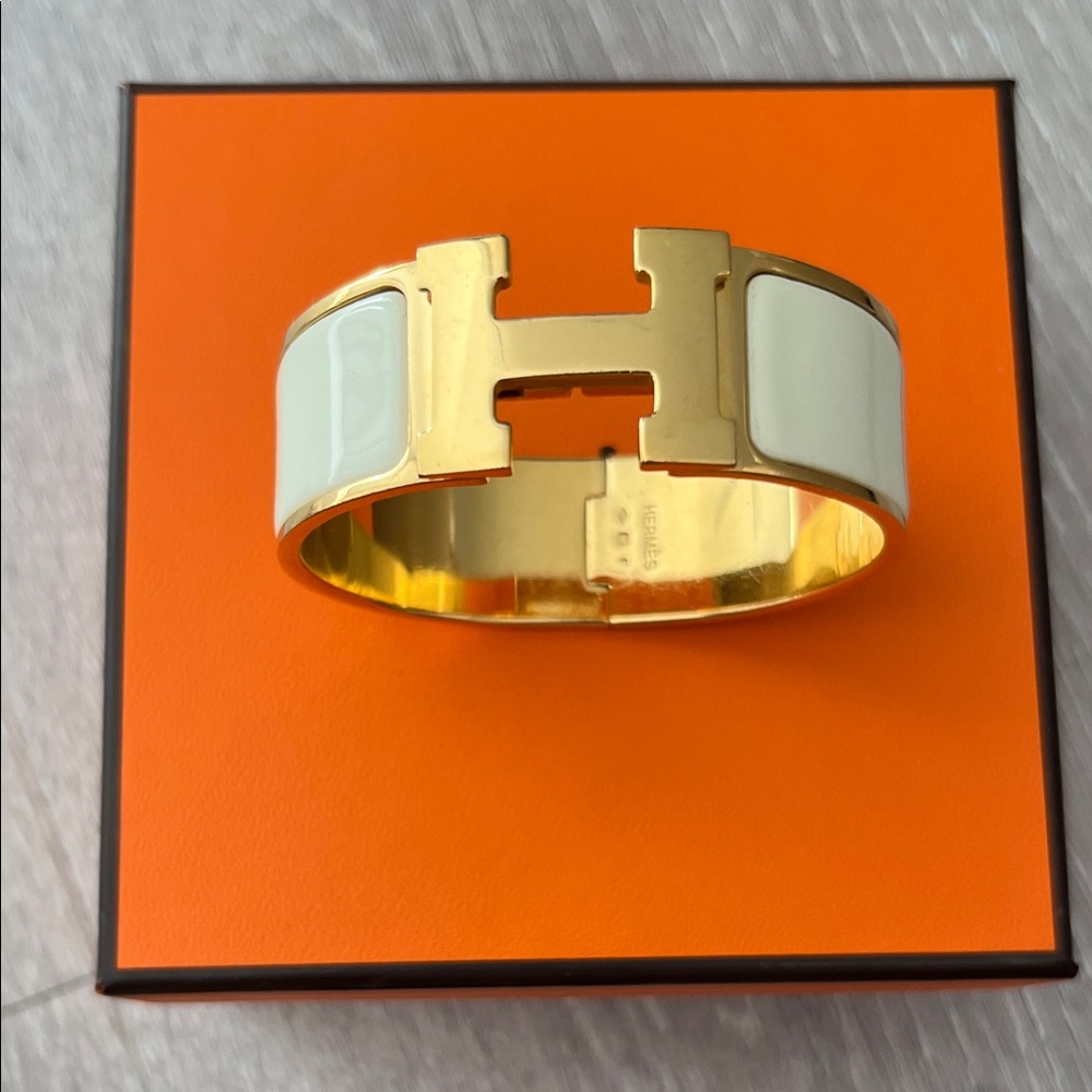 Hermes authentic Gold and Ivory Enamel H Bracelet